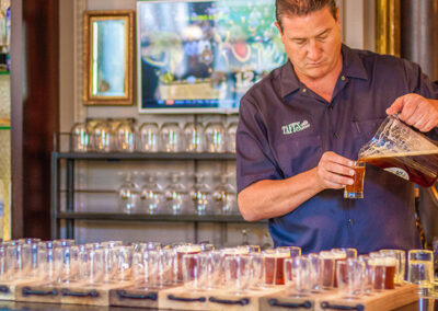Craft Brewer Pouring Beers on Beer Tour in Louisville