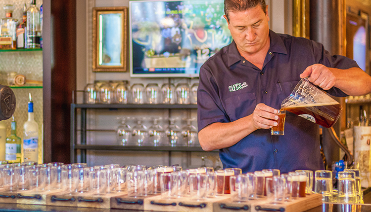 Craft Brewer Pouring Beers on Beer Tour in Louisville