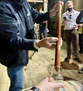 whiskey thief pulling bourbon straight from the barrel