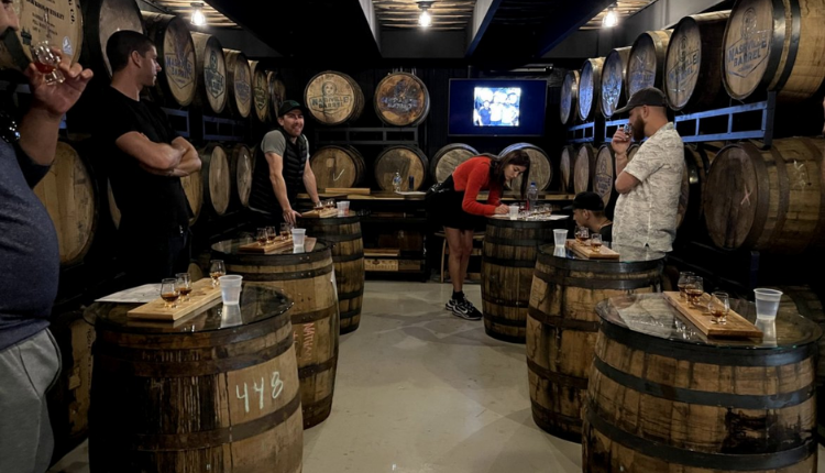 group of people participating in a Single Barrel Selection at Nashville Barrel Co
