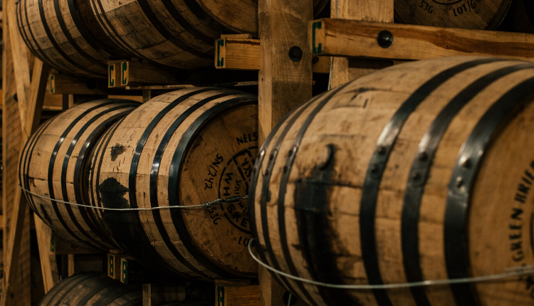 Whiskey barrels on the state line distillery tour