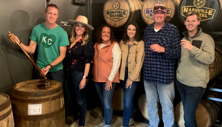 group at Nashville Barrel Company during private barrel select experience with mint julep experiences
