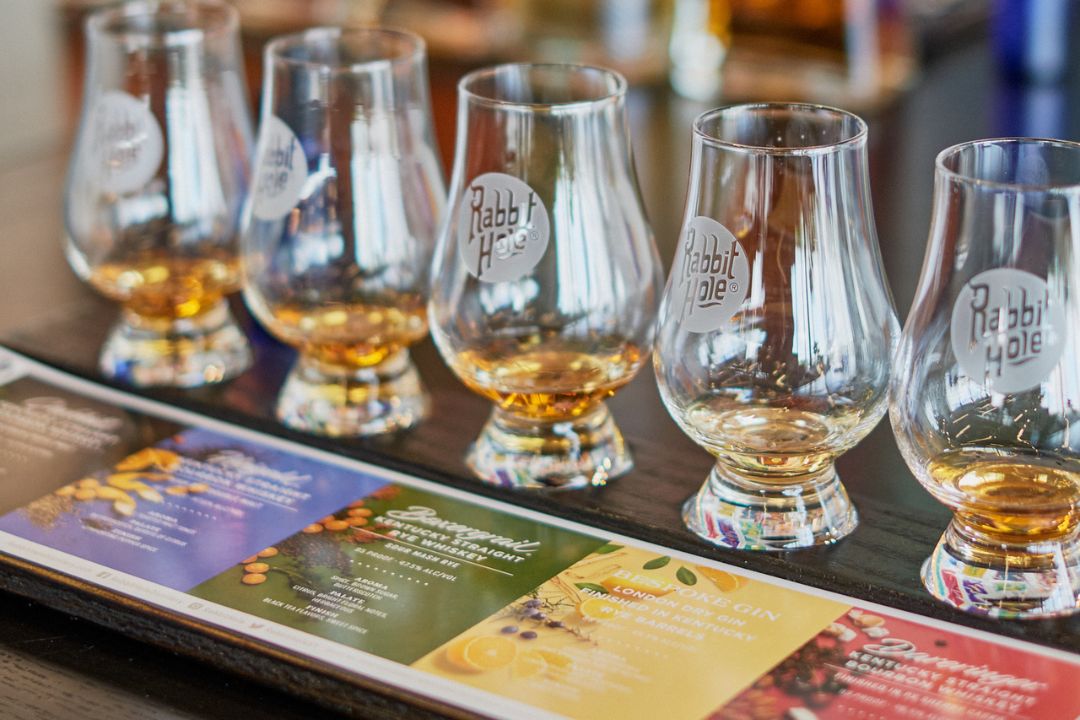 flight of bourbons during a tasting at rabbit hole distillery