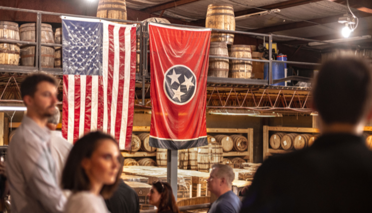 Whiskey distillery with a U.S. flag and Tennessee state flag hanging