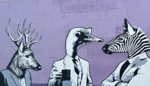 nashville mural animals in suits drinking coffee and talking