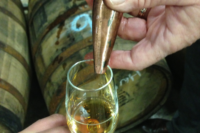bourbon pour from whiskey thief on straight from the barrel bourbon tour and tasting