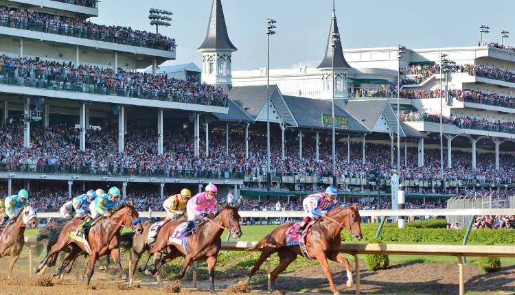 Horse race at Churchill Downs with packed stadium