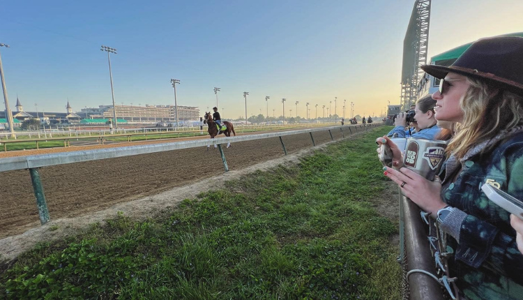 Woman viewing Kentucky horse race