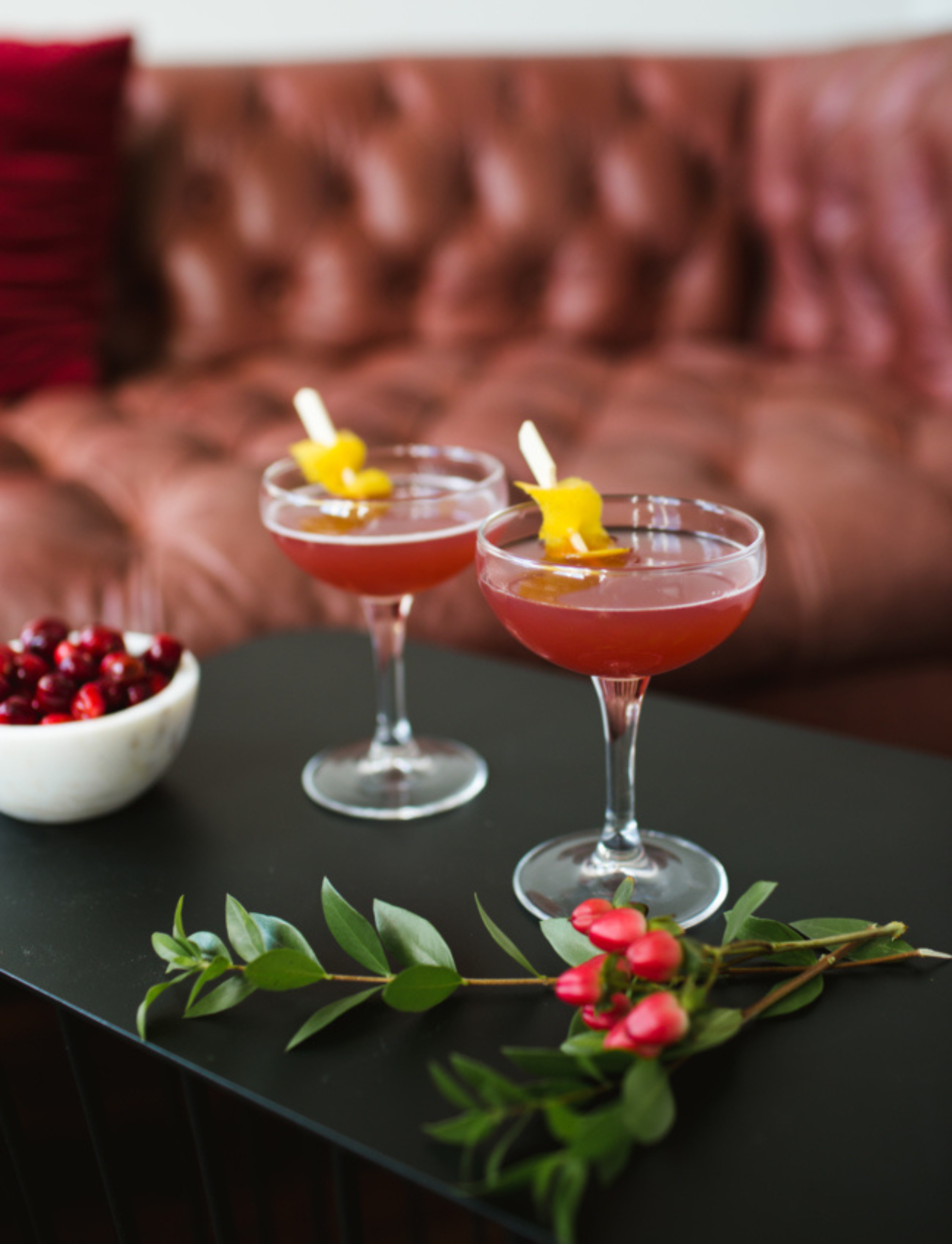 Festive red cocktail in lounge setting