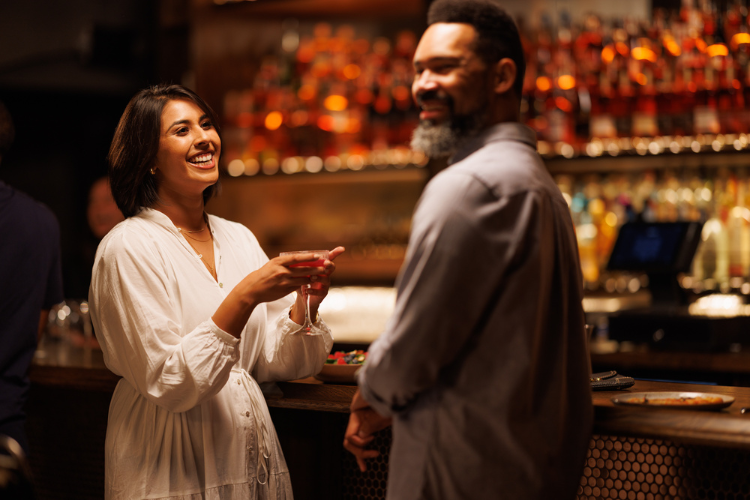 Couple enjoying a drink at bar