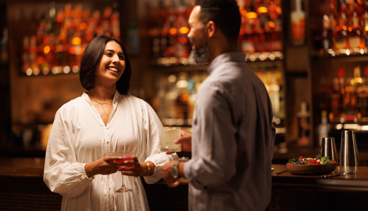 Couple enjoying a drink at bar