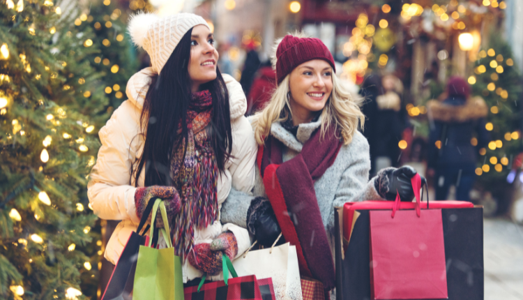 Two girls christmas shopping