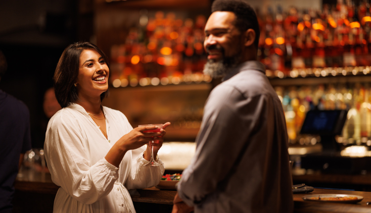 Couple enjoying a drink at bar